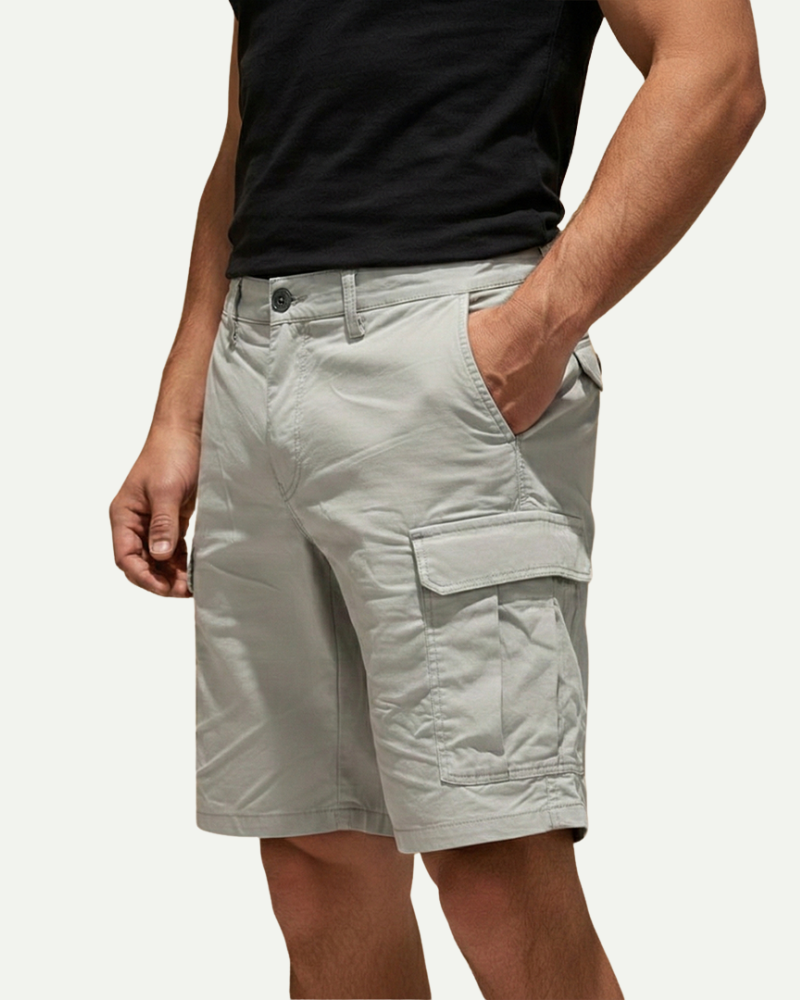 male model wearing light grey cargo shorts side view Lubomirske