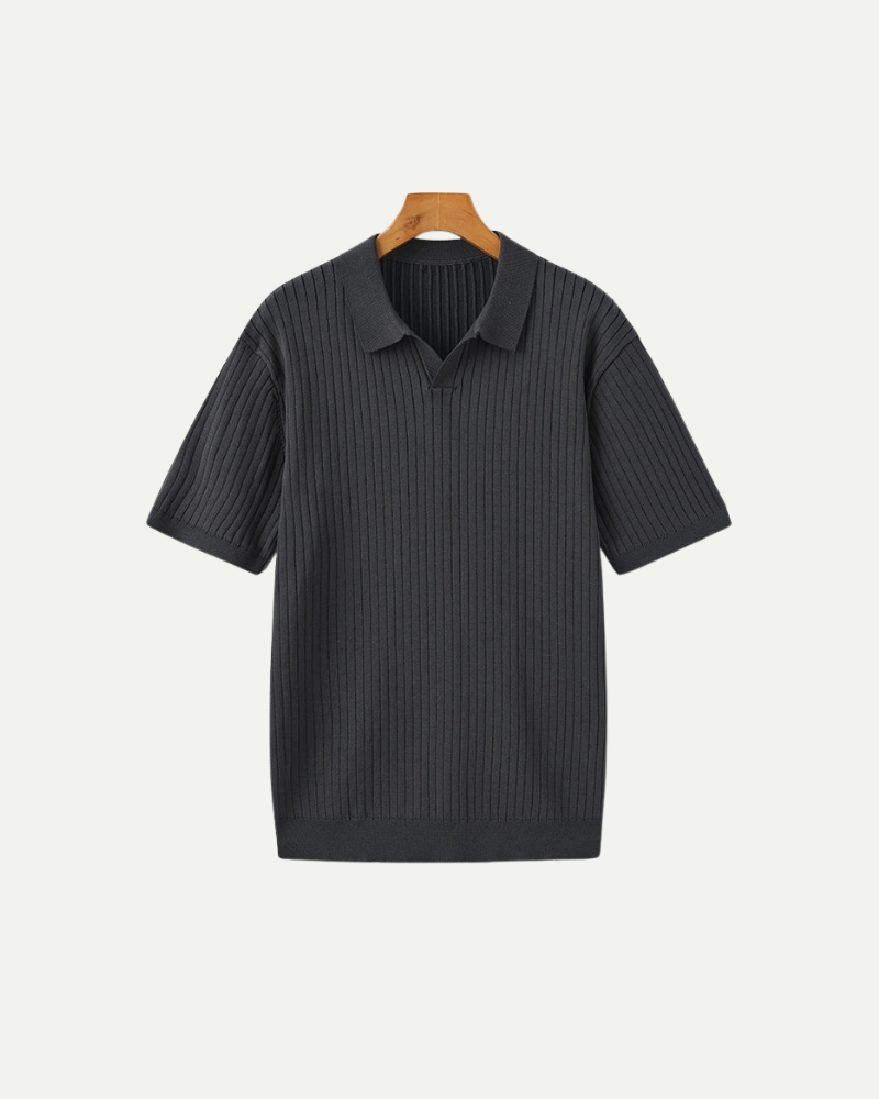 Dark ribbed knit polo shirt on a hanger against a white background