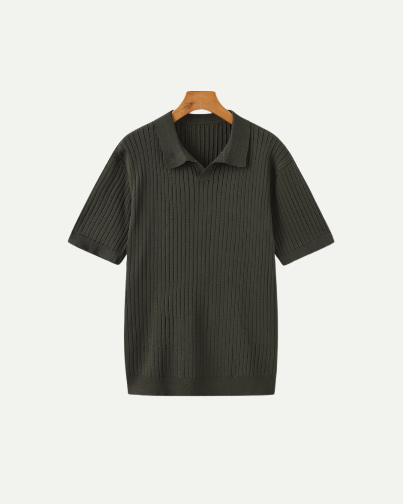 Dark green ribbed polo on a wooden hanger against a white background