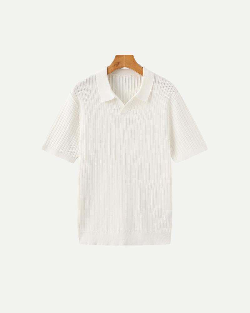 White ribbed knit polo shirt on a hanger against a white background