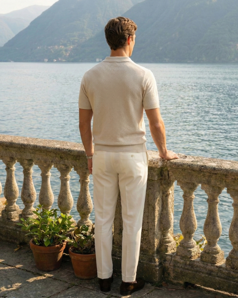 Men’s ivory knit polo shirt relaxed fit back view full body by seaside