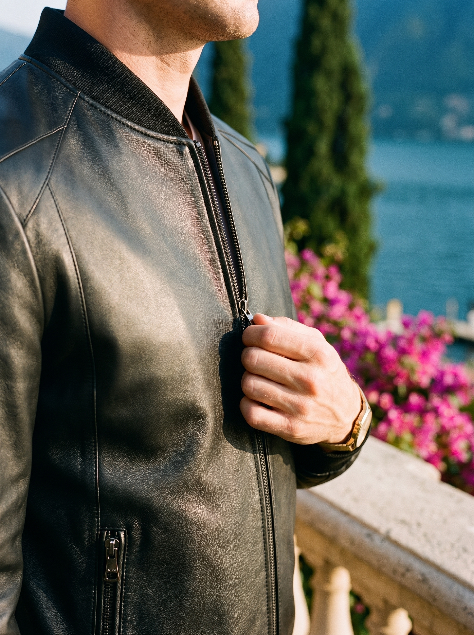 Black leather bomber jacket collar zip detail — Aveloire