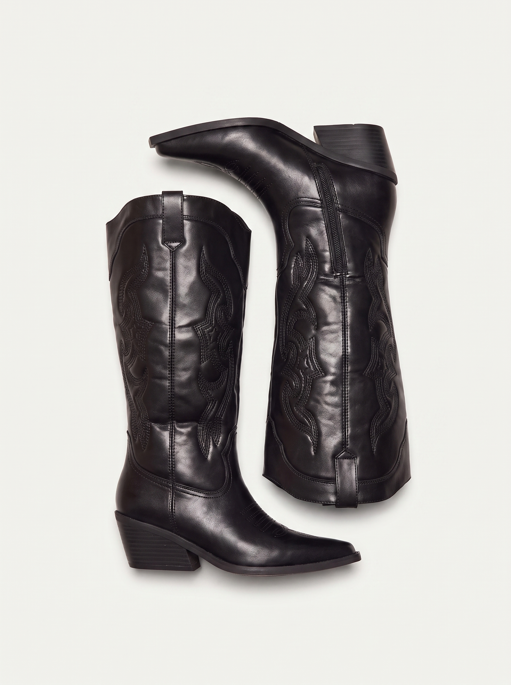 Black pointed toe western knee high boots flat lay product photo — Mella by Aveloire