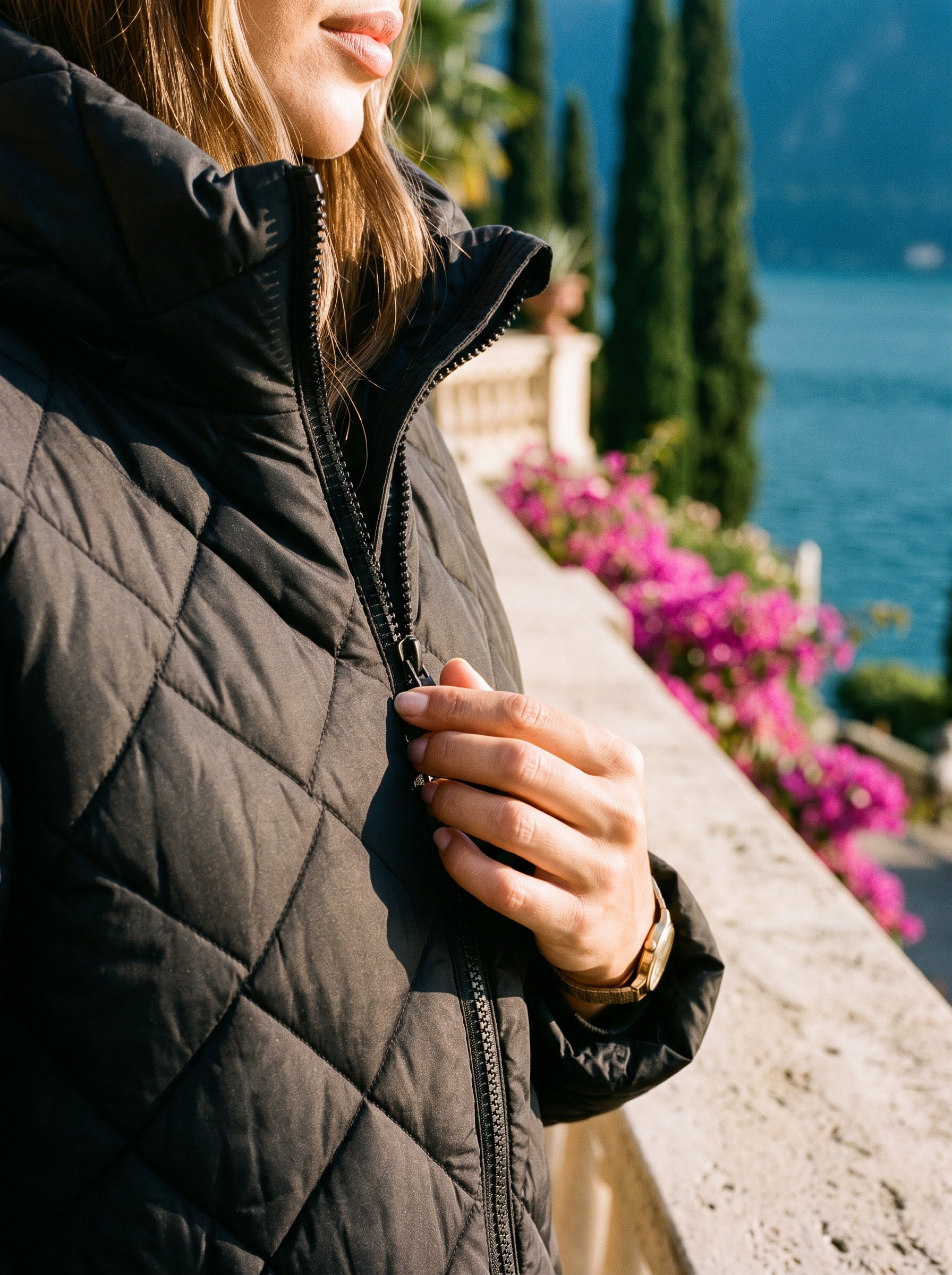 Black quilted coat collar closure detail — Aveloire