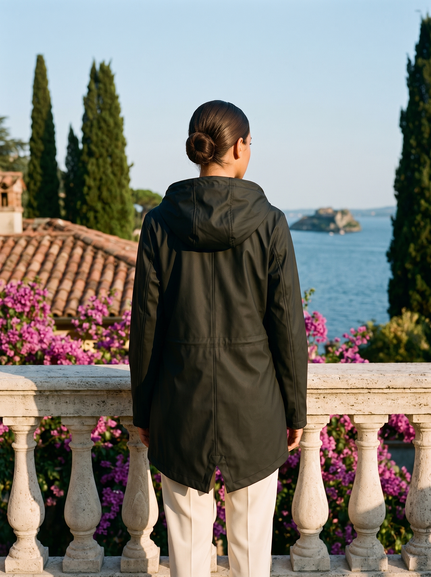 Black waterproof rain jacket full body back view — Aveloire