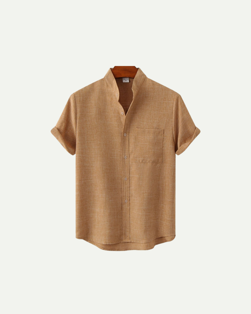 Beige short-sleeve shirt on a light beige background