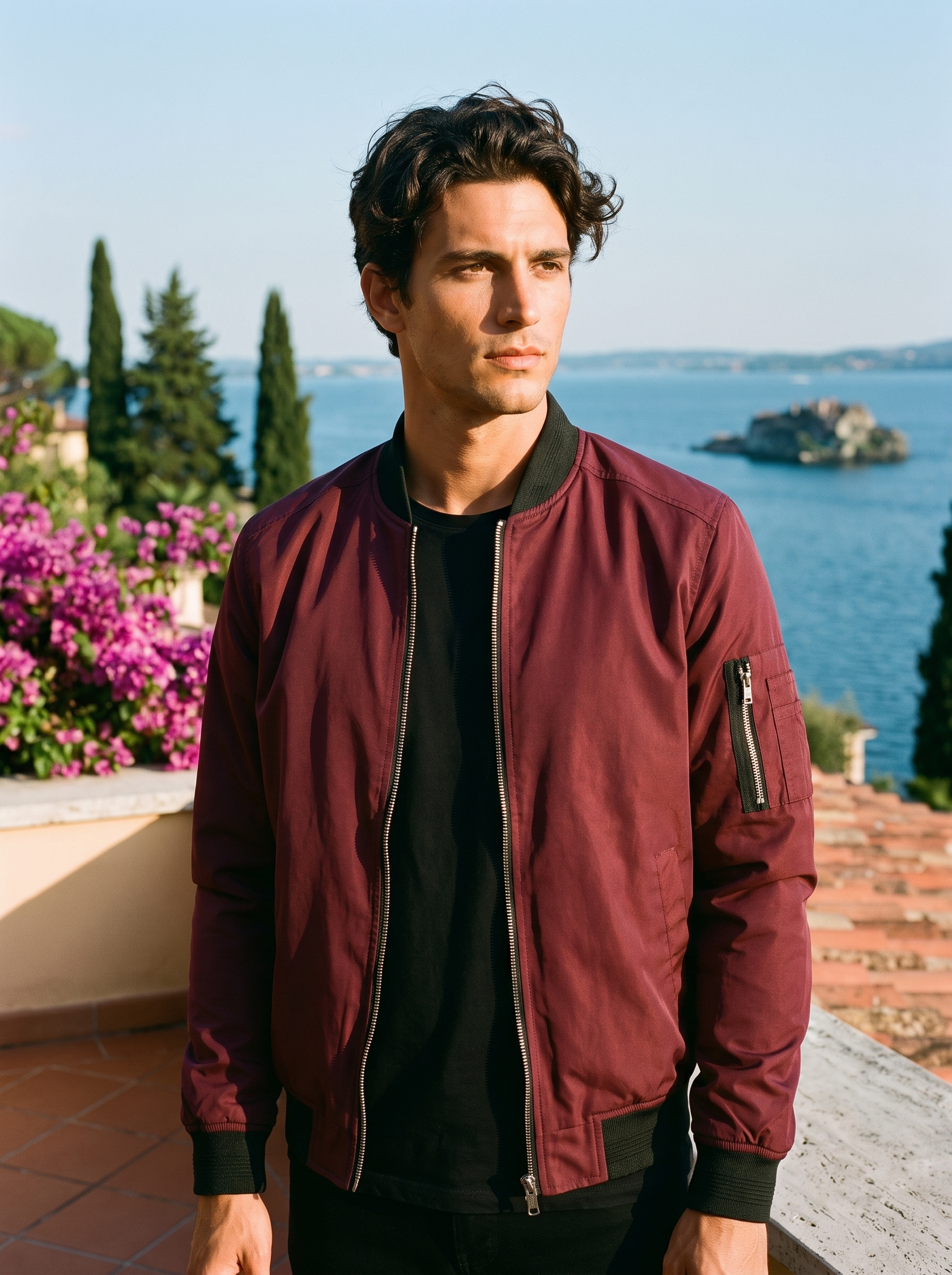 Man wearing red bomber jacket on a Lake Como terrace — Aveloire