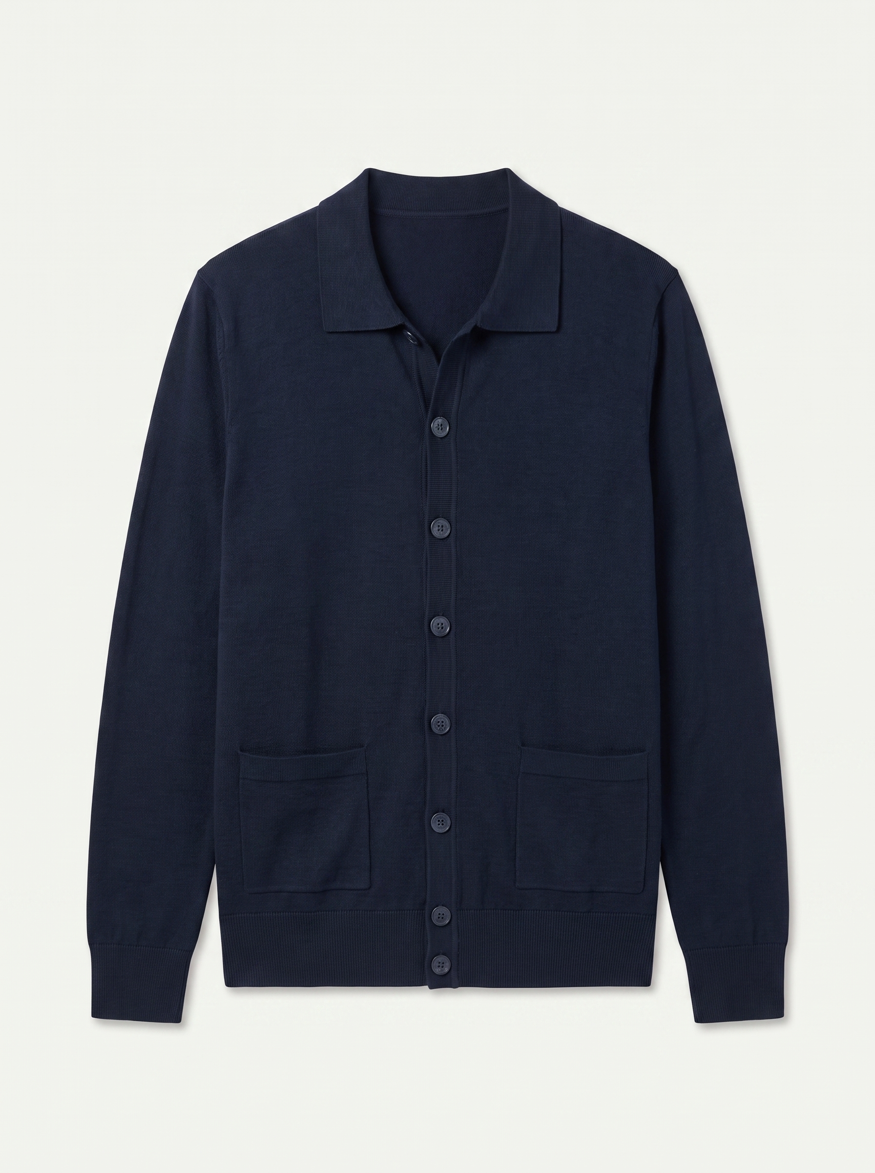 Navy button-up collared cardigan with patch pockets, flat lay product photo — Laurent by Aveloire