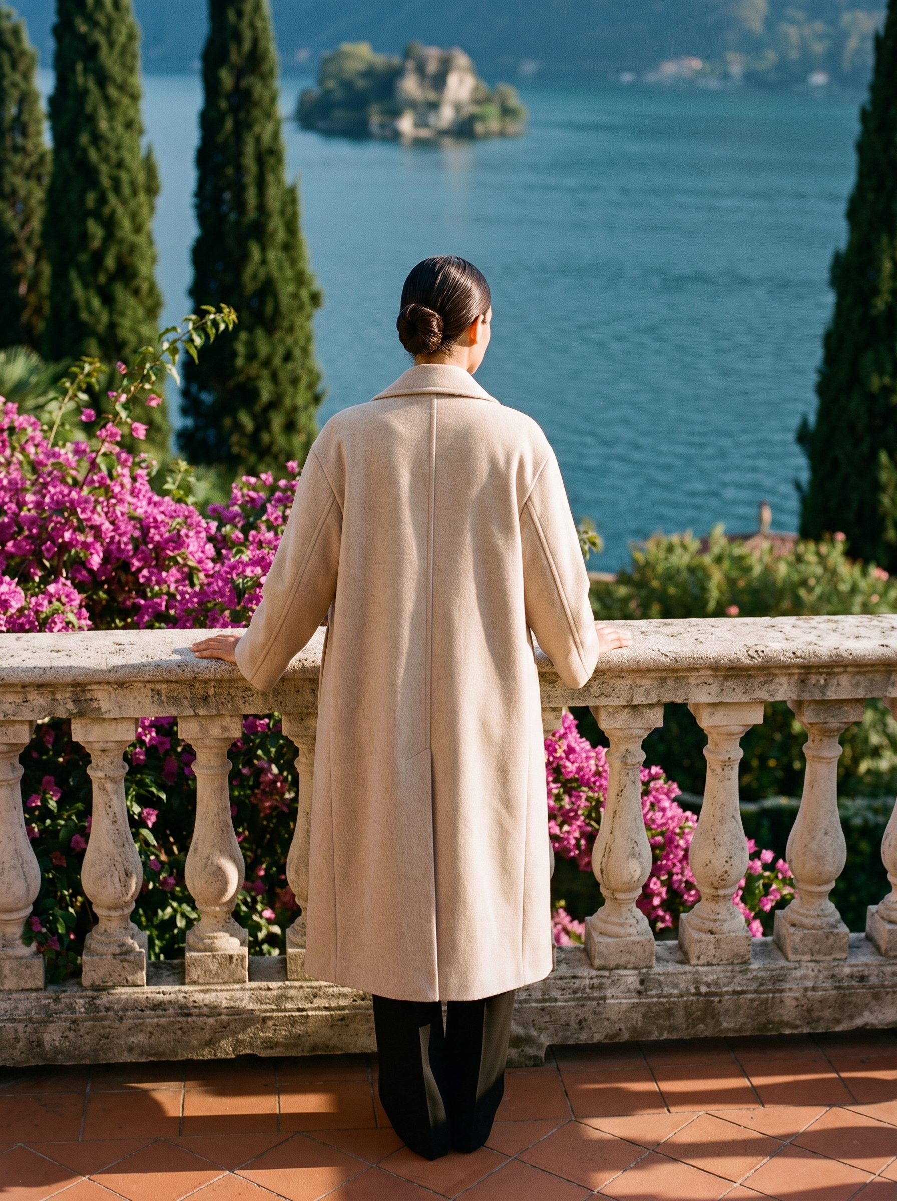 Back view of an oatmeal wool overcoat on a Lake Como terrace — Aveloire