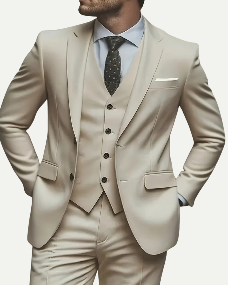 Close up male model wearing beige tuxedo suit vest tailored formal outfit detail
