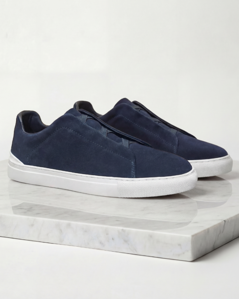 Men navy suede minimalist sneakers slip on casual shoes pair product display
