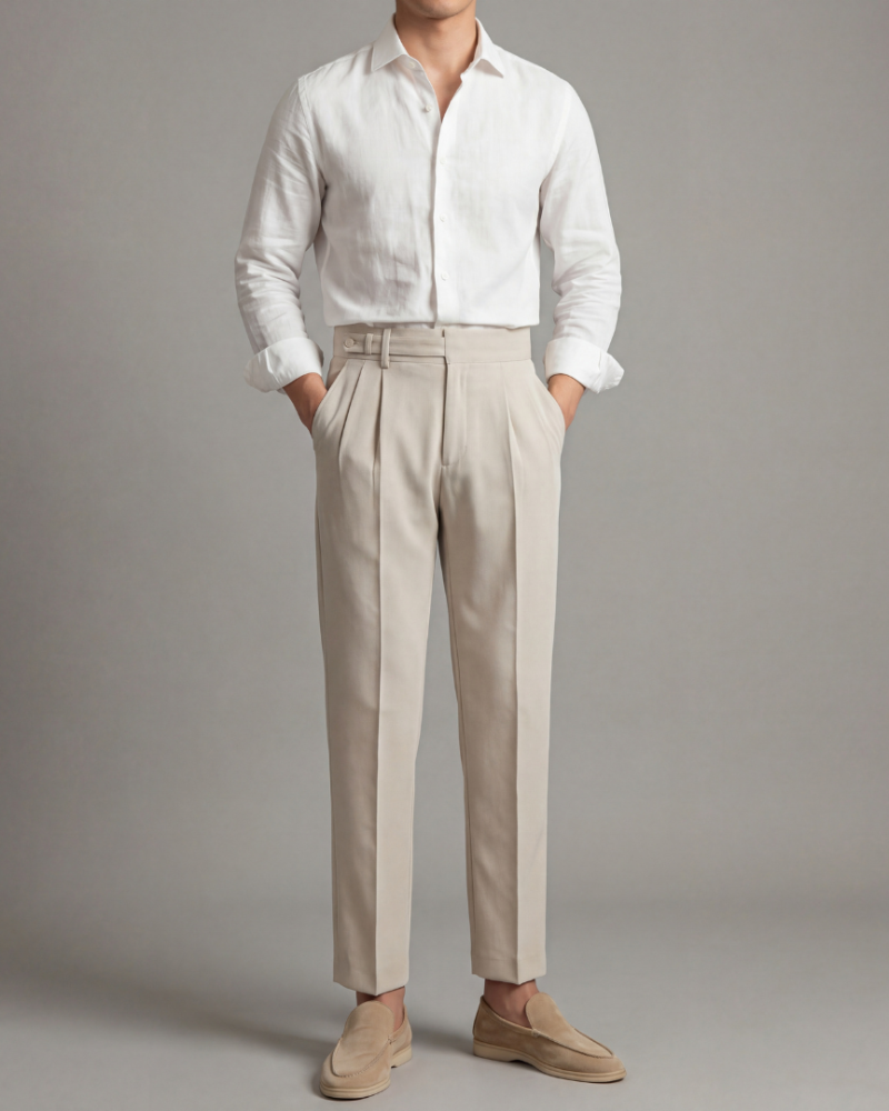 Male model wearing beige tailored dress trousers with pleats smart casual outfit full body

