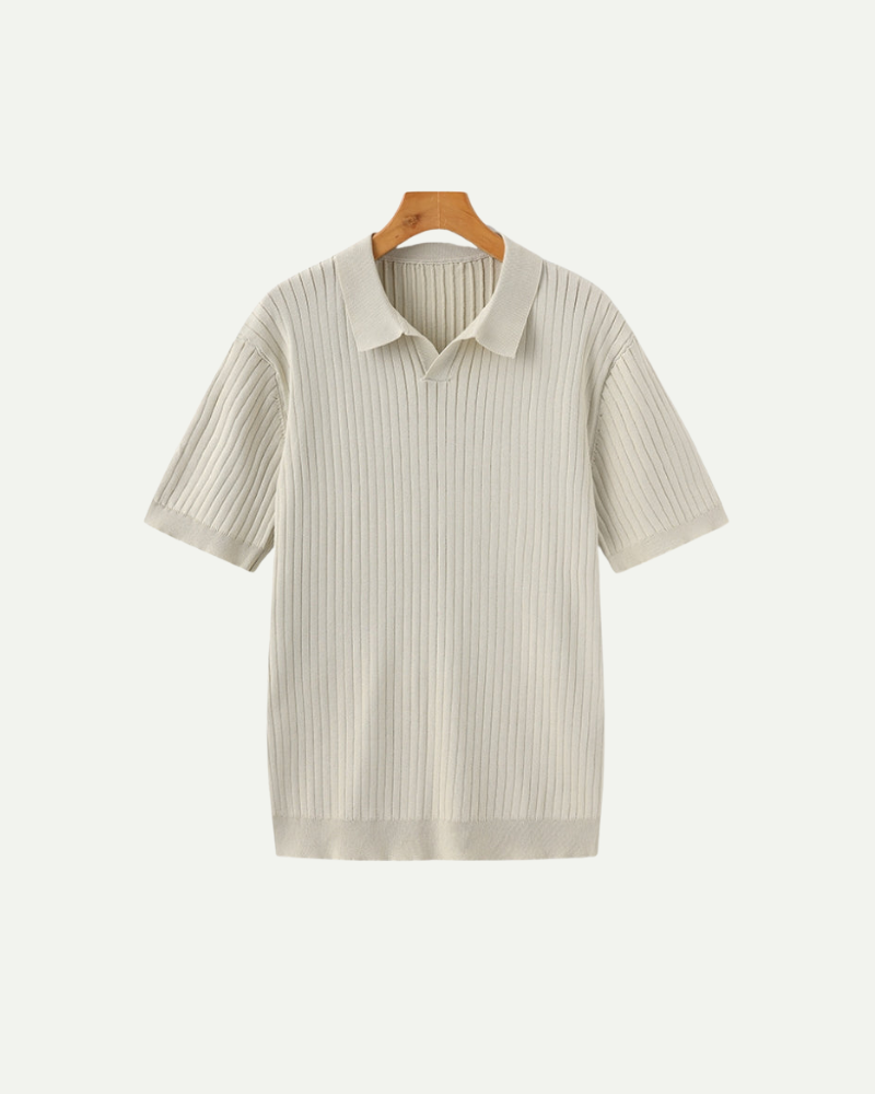 Beige ribbed knit polo shirt on a hanger against a white background