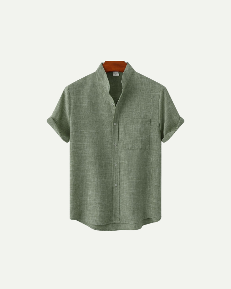 Green short-sleeve shirt on a white background