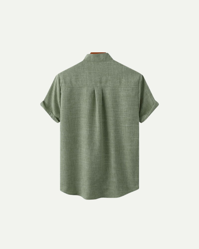 Green short-sleeve shirt on a white background