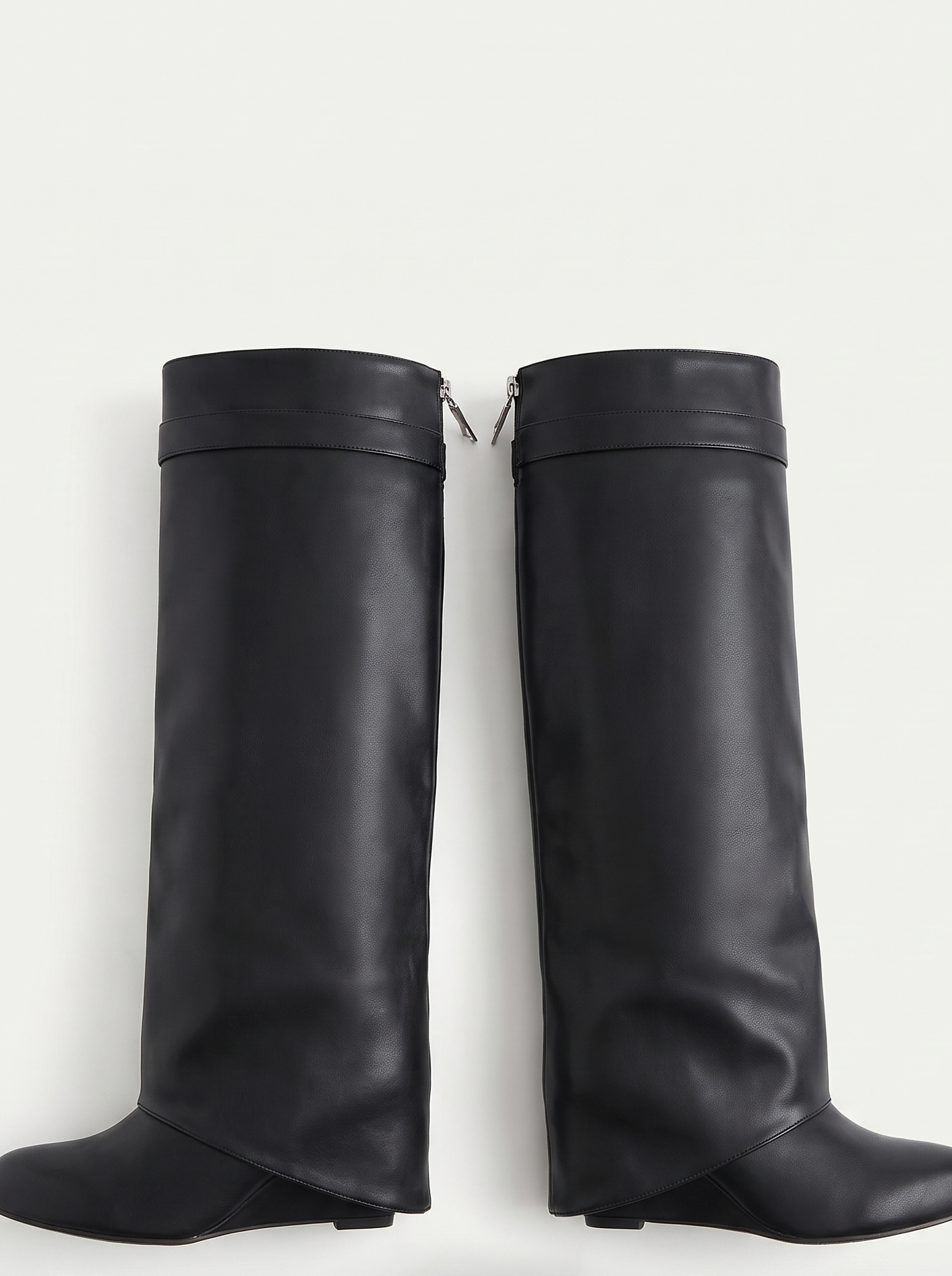 Black fold-over knee high boots flat lay product photo — Isabelle by Aveloire