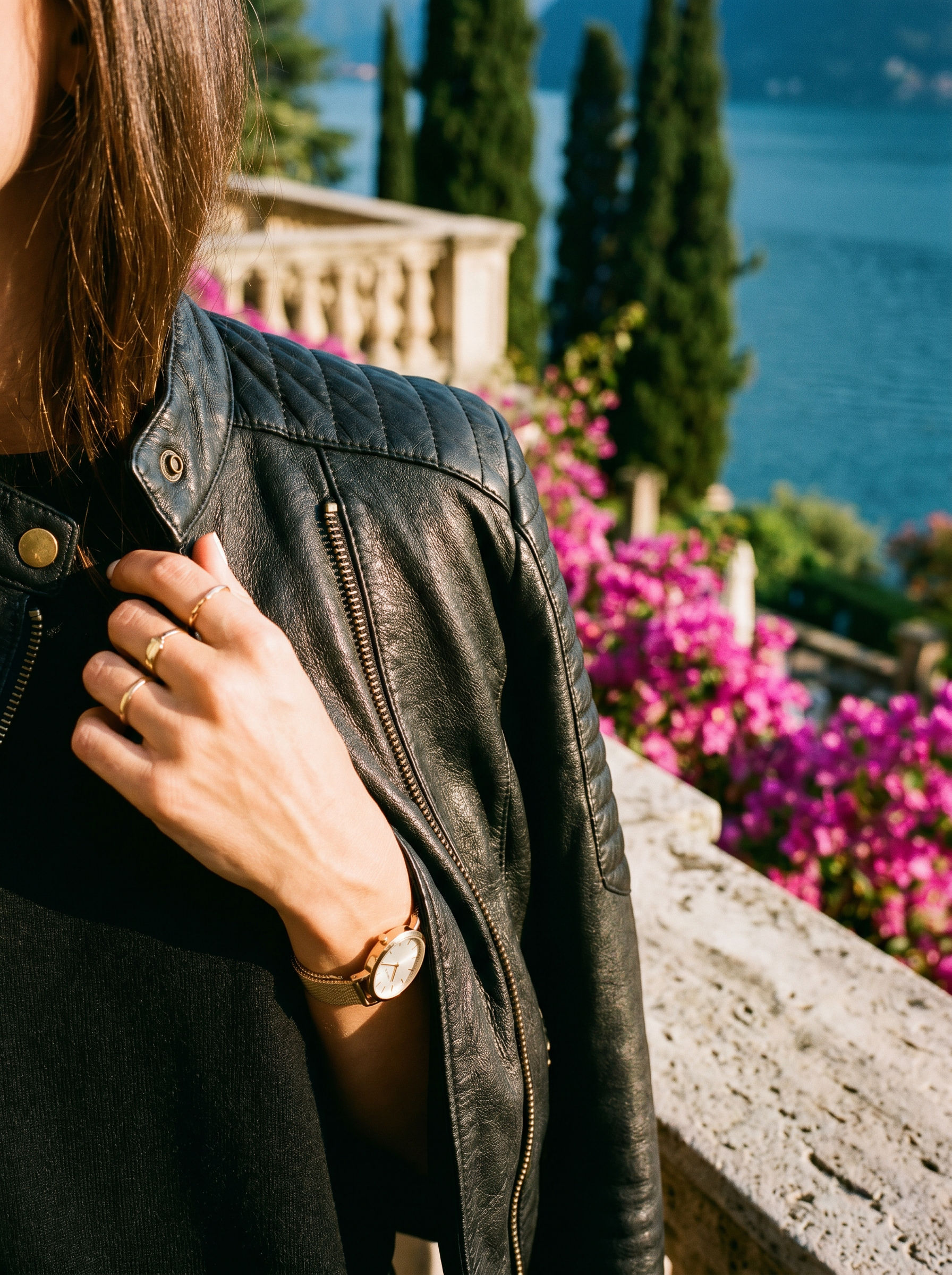 Black leather jacket collar closure detail — Aveloire