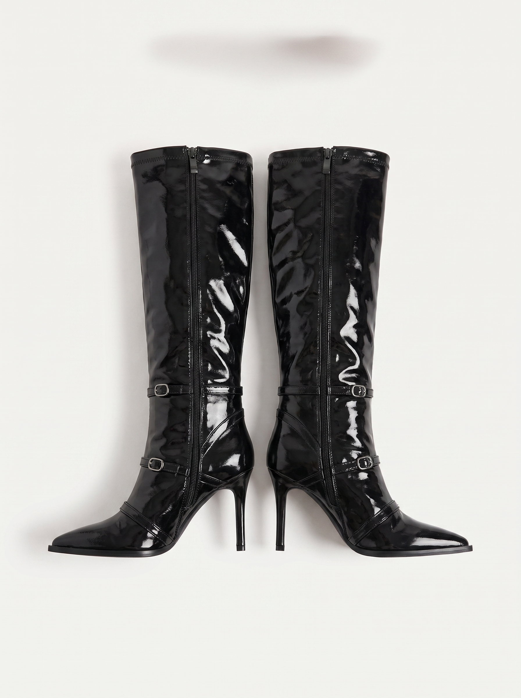 Black patent stiletto knee high boots flat lay product photo — Zyra by Aveloire
