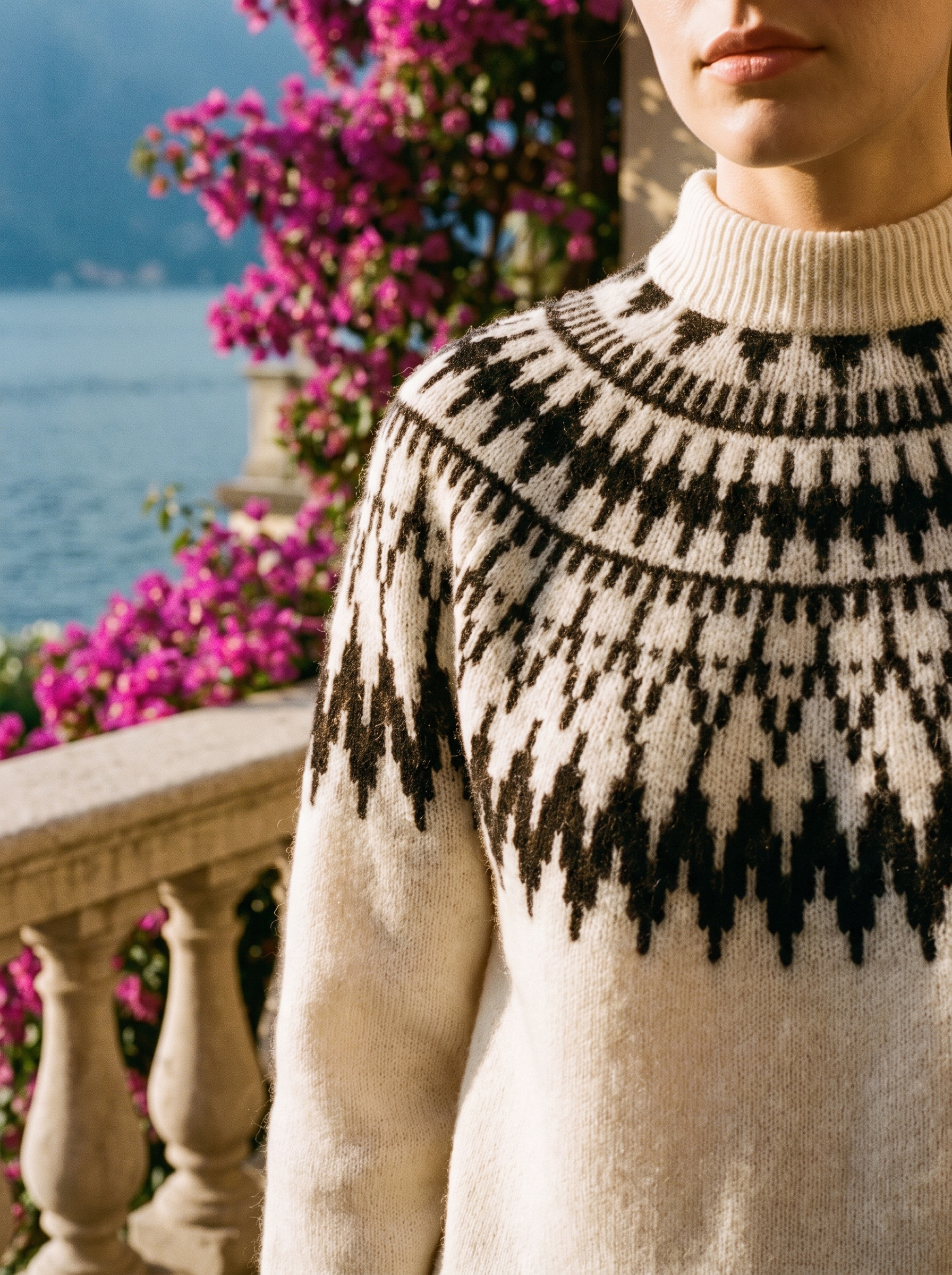 Close-up of the Fair Isle yoke pattern of a cream mock-neck jumper — Aveloire