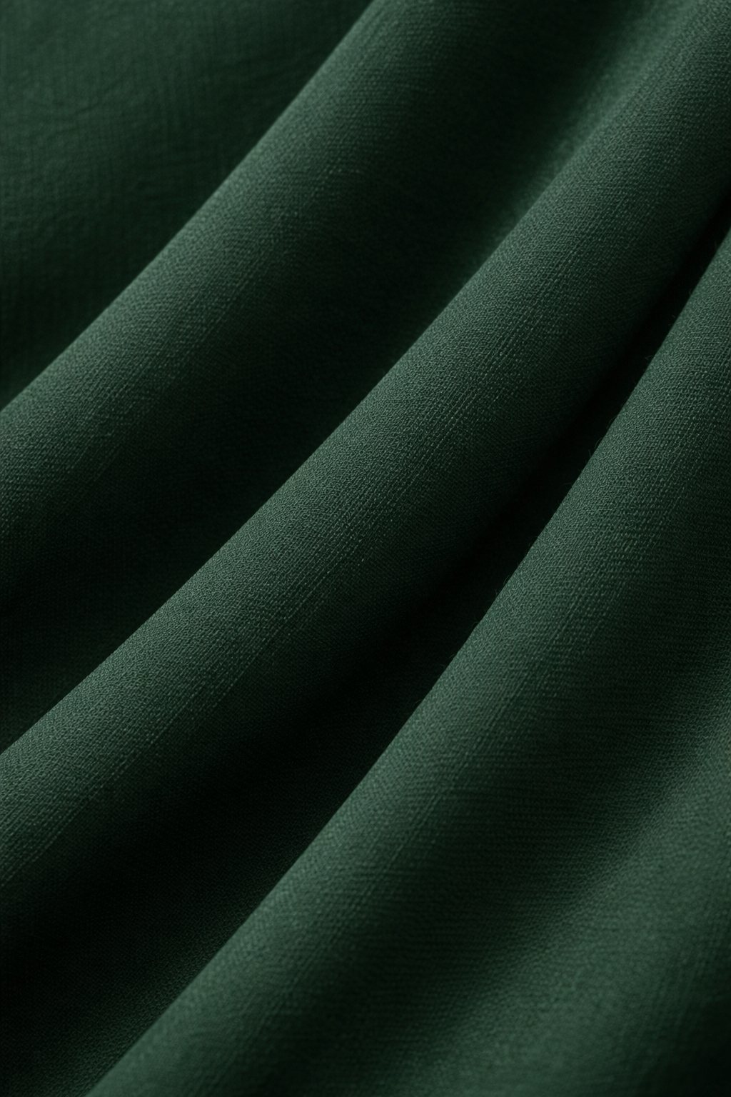 Green fabric detail maxi dress lightweight flowing texture close up