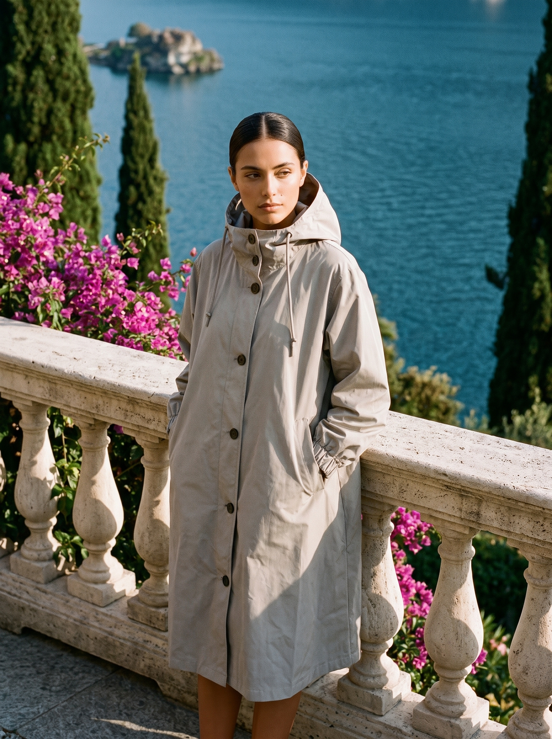 Stone grey water-repellent hooded raincoat full length front view