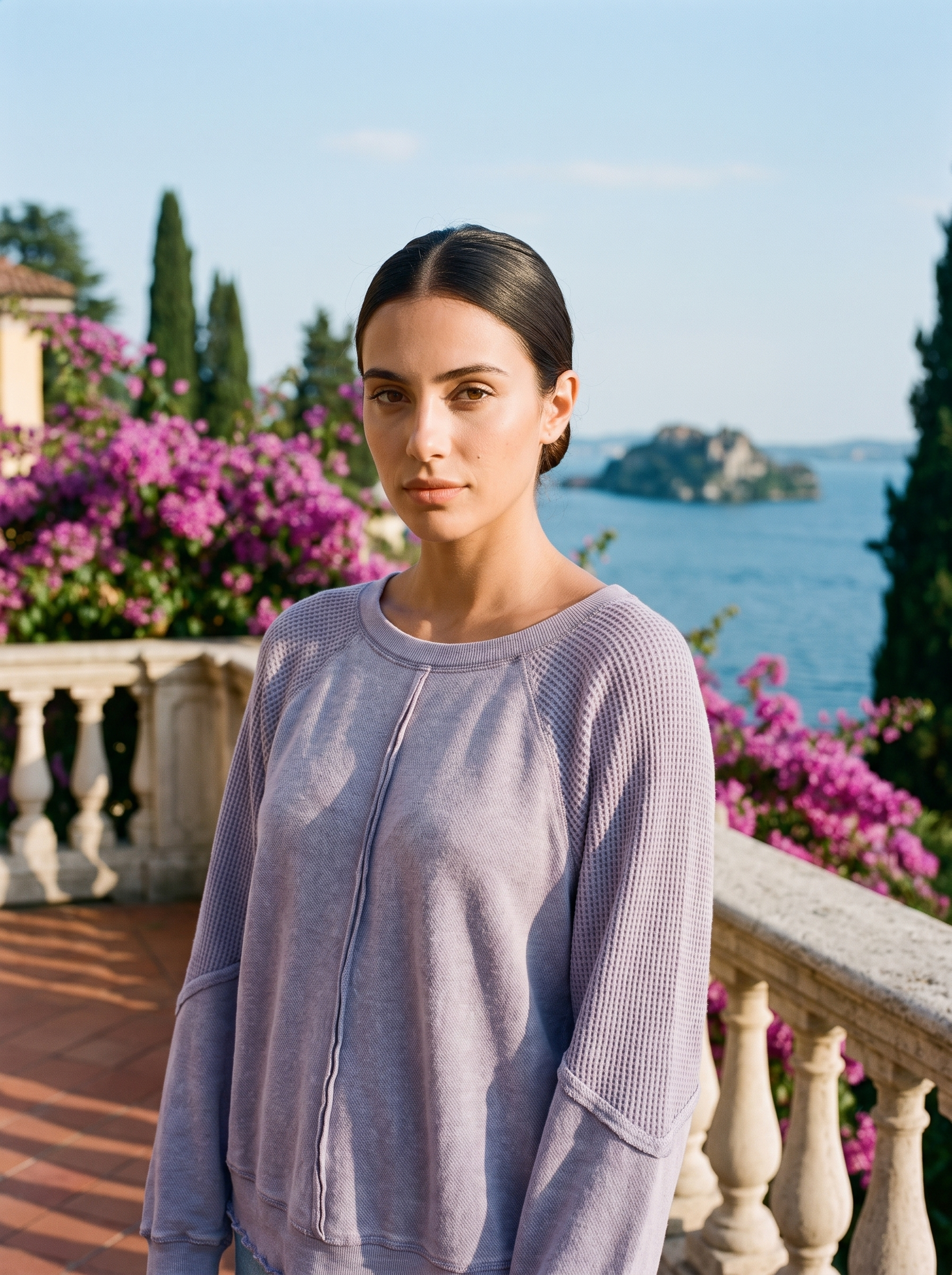 Woman wearing a dusty lavender waffle-panel top on a Lake Como terrace — Aveloire
