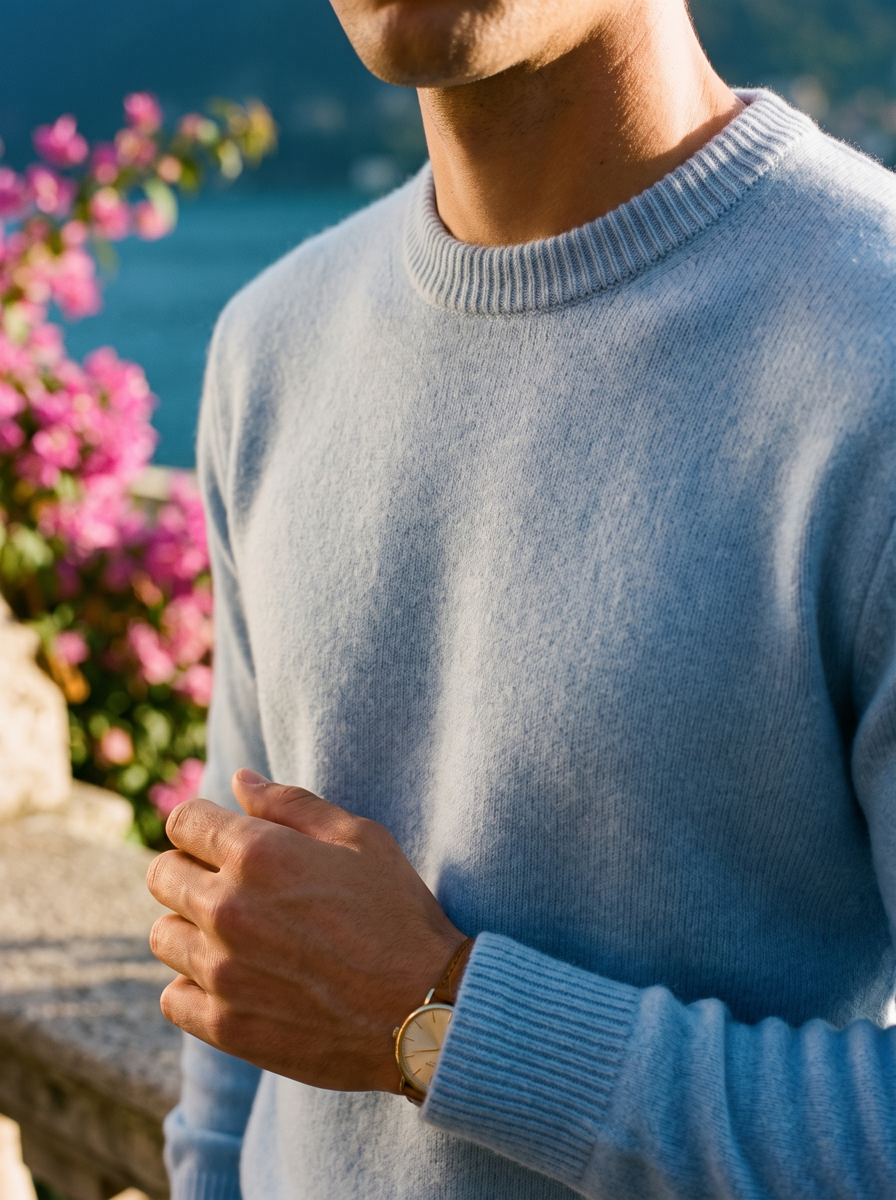 Ribbed crew neck collar and brushed knit detail of a light blue sweater — Aveloire