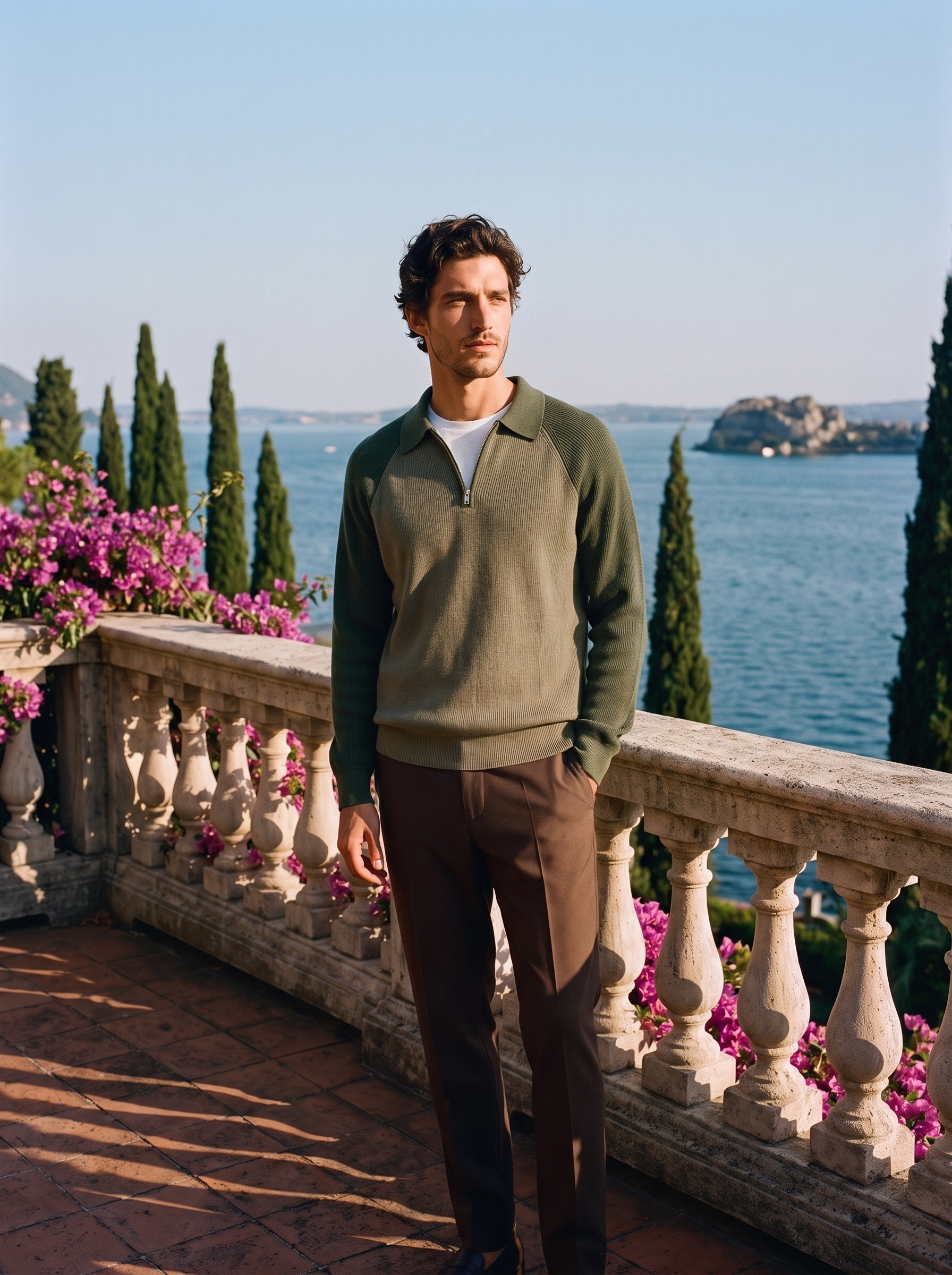 Man wearing a two-tone army green half-zip knit polo sweater on a Lake Como terrace, old money style — Aveloire