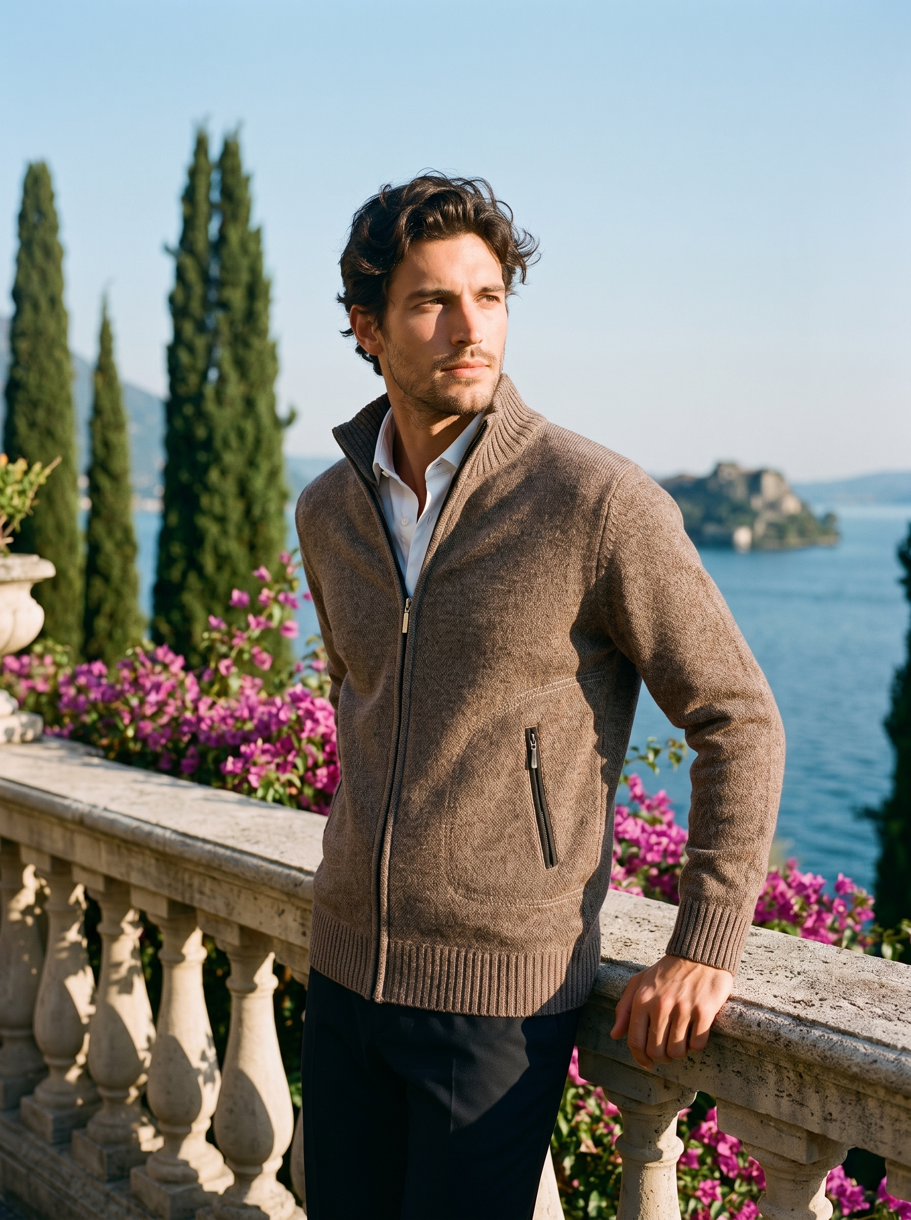 Man wearing a brown melange zip-up stand collar cardigan on a terrace overlooking Lake Como, old money style — Aveloire