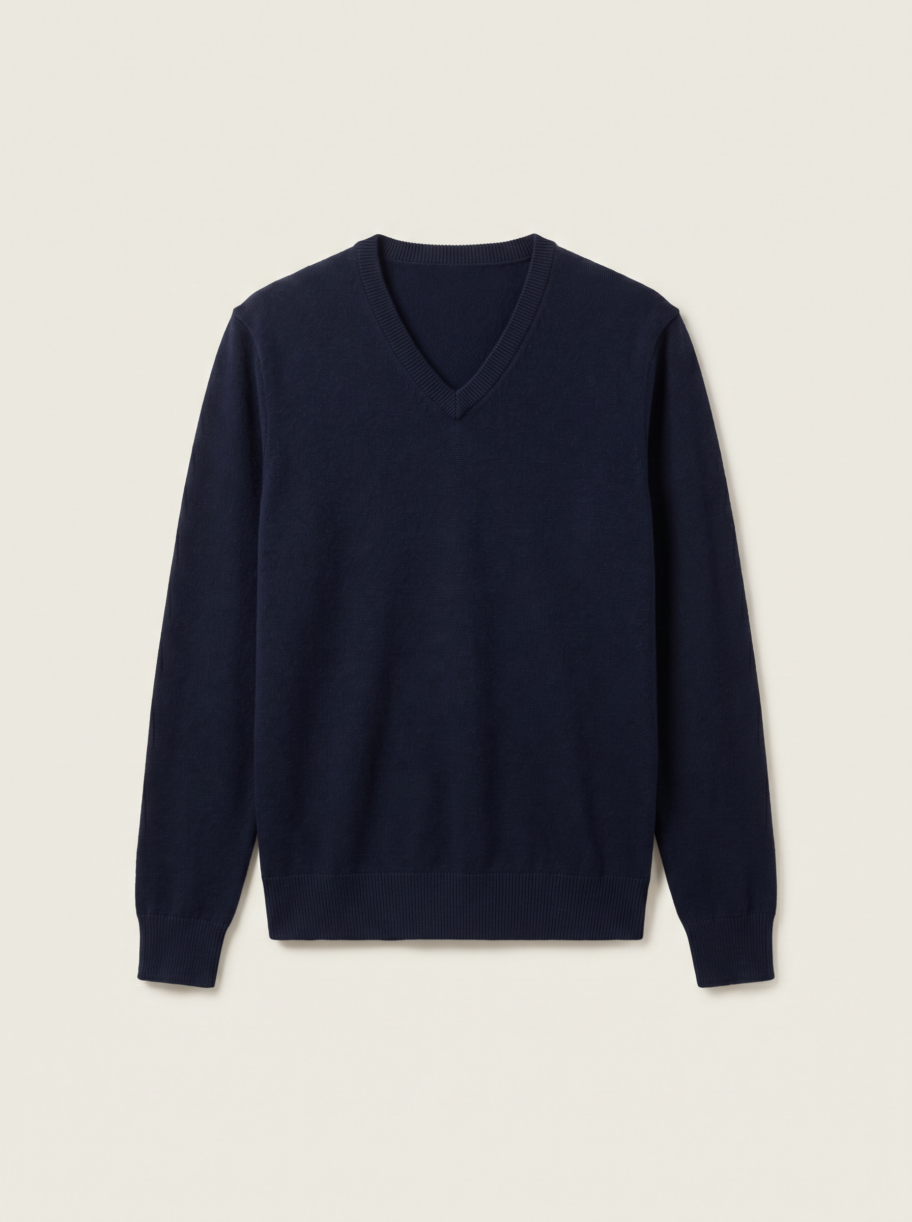Navy wool V-neck sweater flat lay product photo — Aurelien by Aveloire
