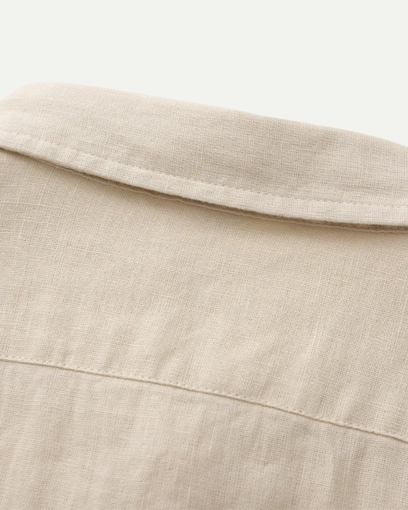Linen shirt collar detail beige breathable fabric texture close up