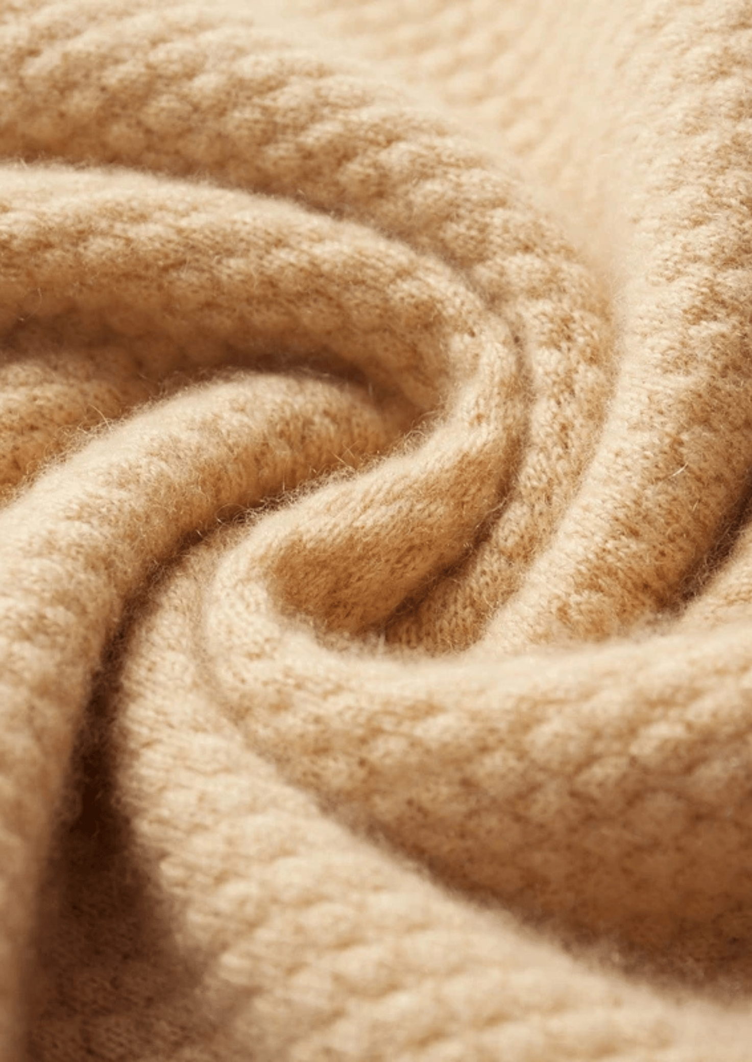 Close-up of beige fabric with a textured pattern