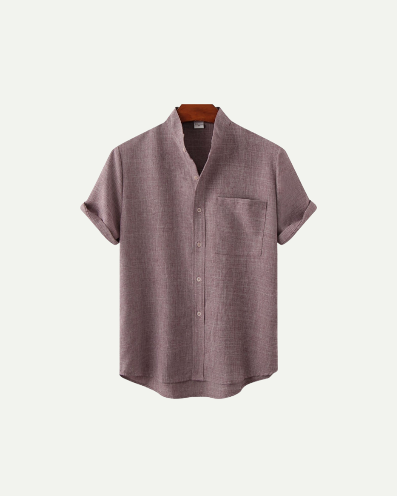 Purple short-sleeve shirt on a light gray background