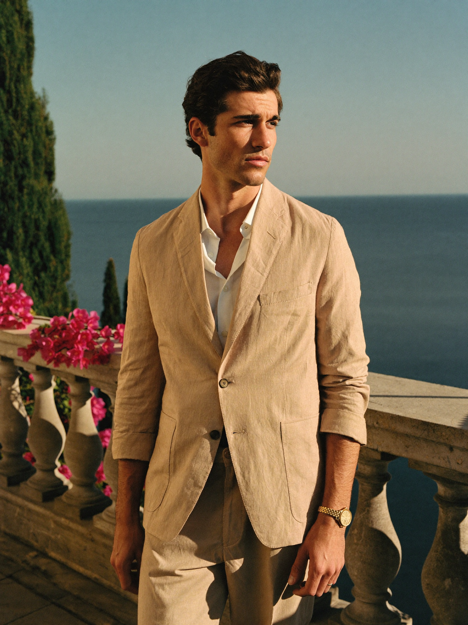 Men's Aveloire Valmont slim-fit linen suit in beige — full-length on a Lake Como terrace